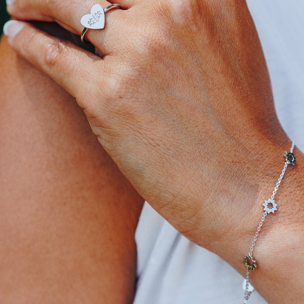 tiny nine pointed bahai star outline silver bracelet